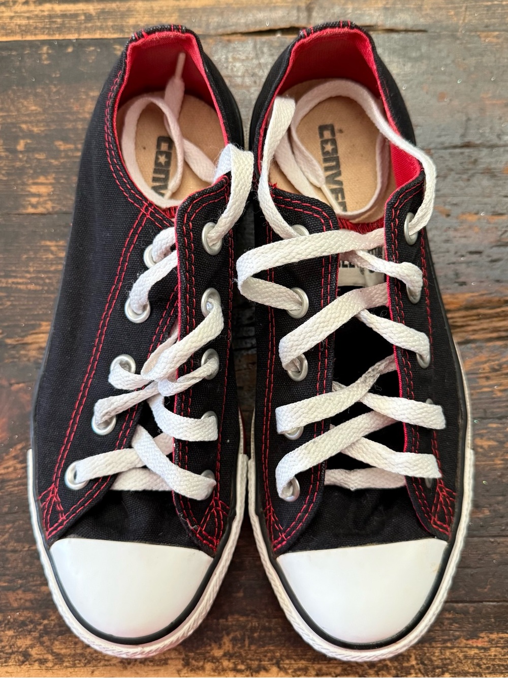 Converse Black Canvas Sneakers with Red Accents and White Laces